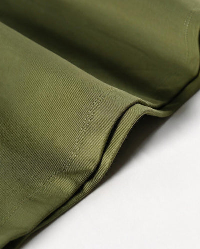 Olive t-shirt, close-up of hem and fabric texture
